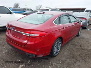 2017 Ford Fusion SE z VIN 3FA6P0H98HR175087, wystawiony jako IAAI lot #41557481 z przebiegiem 103 752 mil mil oraz . Historia ofert i sprzedaży dostępna na DreamBid. Obrazek 4.