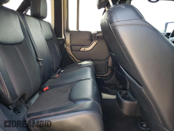 2016 Jeep Wrangler Unlimited Sahara with VIN 1C4BJWEG6GL212733, listed as a Copart auction lot 62664445 with 114,004 mi miles and Salvage title. Bid and sale history available at DreamBid. Image 11.