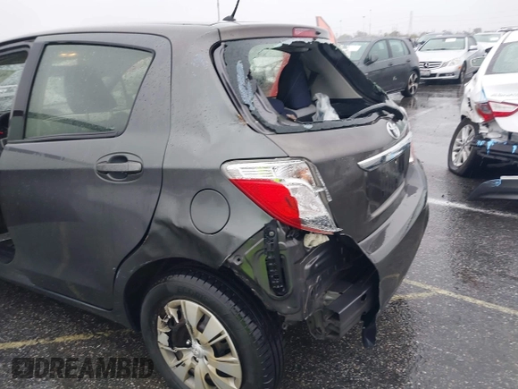 2013 Toyota Yaris L with VIN JTDKTUD39DD552185, listed as a IAAI auction lot 41577259 with 159,662 mi miles. Bid and sale history available at carsss.com. Image 6.