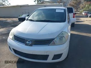 2009 Nissan Versa 1.8 SL with VIN 3N1BC13E19L389134, listed as a IAAI auction lot 41620431 with 190,884 mi miles. Bid and sale history available at carsss.com. Image 6.