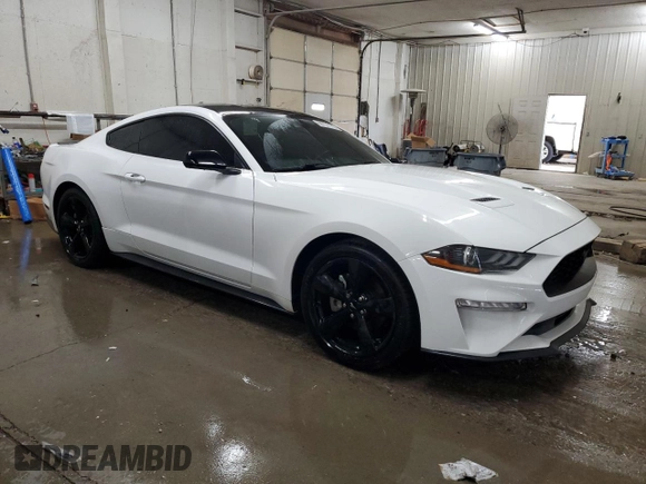 2021 Ford Mustang EcoBoost with VIN 1FA6P8TH8M5121704, listed as a Copart auction lot 60731115 with 44,691 mi miles and Salvage title. Bid and sale history available at DreamBid. Image 4.