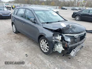 2009 Hyundai Elantra Touring z VIN KMHDC86E89U031895, wystawiony jako IAAI lot #42042357 z przebiegiem 96 298 mil mil oraz . Historia ofert i sprzedaży dostępna na DreamBid. Obrazek 1.