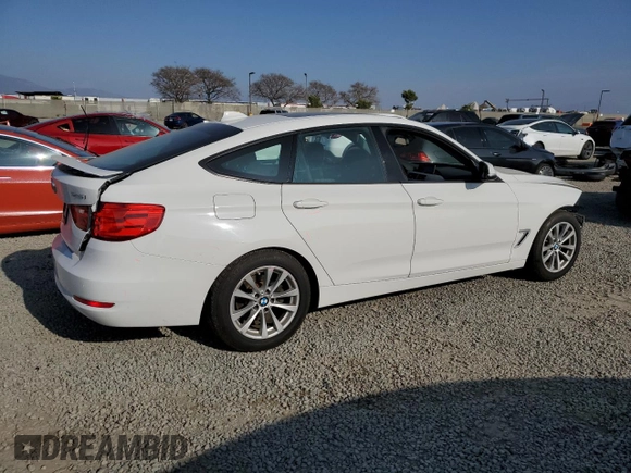 2014 BMW 3 Series 328i Gran Turismo xDrive with VIN WBA3X5C57ED242679, listed as a Copart auction lot 48598665 with 69,712 mi miles and Salvage title. Bid and sale history available at DreamBid. Image 3.