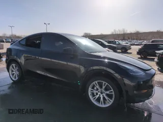 2023 Tesla Model Y Long Range with VIN 7SAYGDEE5PF850358, listed as a Copart auction lot 52581615 with 19,376 mi miles and Salvage Title. Bid and sale history available at DreamBid. Image 4.
