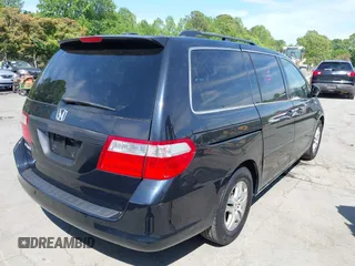 2006 Honda Odyssey EX-L with VIN 5FNRL38756B446740, listed as a IAAI auction lot 42114566 with 224,615 mi miles. Bid and sale history available at carsss.com. Image 4.