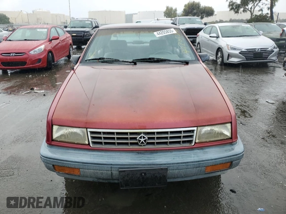 1992 Plymouth Sundance z VIN 1P3XP28D4NN165248, wystawiony jako Copart lot #44205855 z przebiegiem 70 897 mil mil oraz Czysty tytuł • Clean title. Historia ofert i sprzedaży dostępna na DreamBid. Obrazek 6.