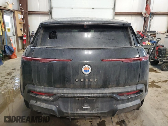 2023 Fisker Ocean Extreme z VIN VCF1EBU2XPG006743, wystawiony jako Copart lot #41668795 z przebiegiem Nie podano mil oraz Szkoda całkowita • Salvage title. Historia ofert i sprzedaży dostępna na DreamBid. Obrazek 6.