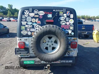 2005 Jeep Wrangler Unlimited with VIN 1J4FA44S55P352803, listed as a IAAI auction lot 42688284 with 128,586 mi miles and . Bid and sale history available at DreamBid. Image 16.