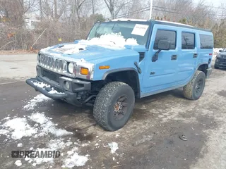 2003 Hummer H2 with VIN 5GRGN23U33H144964, listed as a IAAI auction lot 41621898 with Not Provided miles. Bid and sale history available at carsss.com. Image 2.