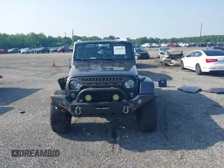 2016 Jeep Wrangler Unlimited Sport with VIN 1C4BJWDG9GL211030, listed as a IAAI auction lot 42459945 with 61,671 mi miles and . Bid and sale history available at DreamBid. Image 12.