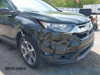 2018 Honda CR-V EX-L z VIN 7FARW2H82JE021578, wystawiony jako IAAI lot #42215280 z przebiegiem 82 571 mil mil oraz . Historia ofert i sprzedaży dostępna na DreamBid. Obrazek 6.