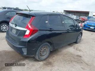 2015 Honda Fit EX-L z VIN 3HGGK5H81FM723962, wystawiony jako IAAI lot #42455367 z przebiegiem 104 859 mil mil oraz . Historia ofert i sprzedaży dostępna na DreamBid. Obrazek 4.