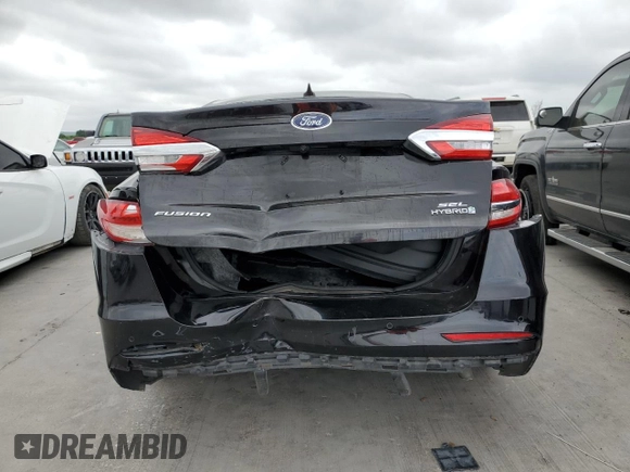 2019 Ford Fusion Hybrid SEL with VIN 3FA6P0MU5KR235893, listed as a Copart auction lot 49295113 with 129,936 mi miles. Bid and sale history available at carsss.com. Image 6.