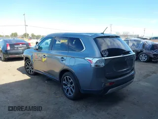 2015 Mitsubishi Outlander GT with VIN JA4JZ4AX1FZ005879, listed as a IAAI auction lot 41701299 with 212,805 mi miles and . Bid and sale history available at DreamBid. Image 3.