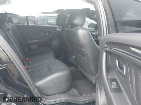 2015 Ford Taurus SHO with VIN 1FAHP2KT7FG148444, listed as a IAAI auction lot 40788614 with 121,533 mi miles and . Bid and sale history available at DreamBid. Image 8.