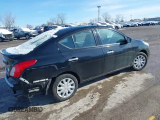 2016 Nissan Versa SV with VIN 3N1CN7AP8GL878746, listed as a IAAI auction lot 41845601 with 118,649 mi miles. Bid and sale history available at carsss.com. Image 4.