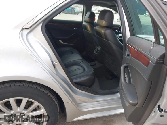2011 Cadillac CTS Luxury with VIN 1G6DG5EY9B0143057, listed as a IAAI auction lot 42023052 with 72,576 mi miles and . Bid and sale history available at carsss.com. Image 8.