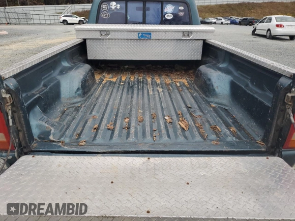1997 Ford Ranger XLT with VIN 1FTCR11X2VTA87152, listed as a Copart auction lot 81559504 with 261,925 mi miles and Salvage title. Bid and sale history available at DreamBid. Image 10.