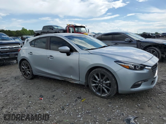 2018 Mazda 3 Touring z VIN 3MZBN1L30JM164074, wystawiony jako Copart lot #56741745 z przebiegiem 86 812 mil mil oraz Szkoda całkowita • Salvage title. Historia ofert i sprzedaży dostępna na DreamBid. Obrazek 4.