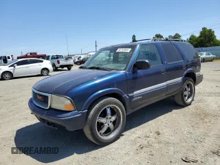 2001 GMC Jimmy SLE Rental Fleet z VIN 1GKDT13W212108144, wystawiony jako Copart lot #58753865 z przebiegiem 254 402 mil mil oraz Szkoda całkowita • Salvage title. Historia ofert i sprzedaży dostępna na DreamBid. Obrazek 1.