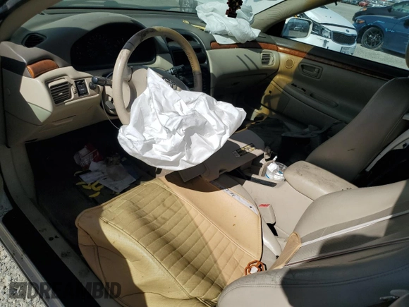 2002 Toyota Solara SE z VIN 2T1FF28P22C595397, wystawiony jako Copart lot #58276695 z przebiegiem Nie podano mil oraz Szkoda całkowita • Salvage title. Historia ofert i sprzedaży dostępna na DreamBid. Obrazek 8.