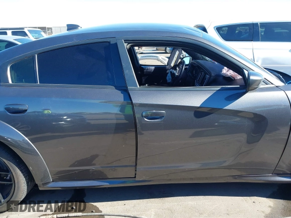 2022 Dodge Charger Scat Pack Widebody with VIN 2C3CDXGJ1NH204130, listed as a IAAI auction lot 41392893 with 9,515 mi miles and . Bid and sale history available at DreamBid. Image 13.