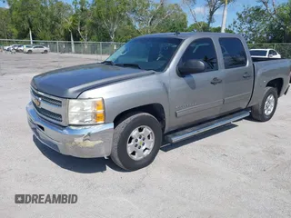 2013 Chevrolet Silverado 1500 LT with VIN 3GCPCSE01DG206827, listed as a IAAI auction lot 41976945 with 213,940 mi miles and . Bid and sale history available at DreamBid. Image 20.