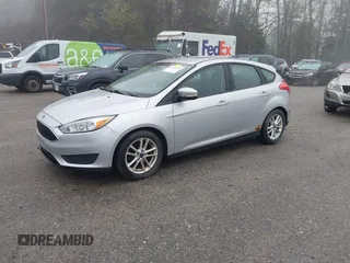 2015 Ford Focus SE with VIN 1FADP3K2XFL364856, listed as a IAAI auction lot 42190028 with 170,436 mi miles. Bid and sale history available at carsss.com. Image 2.
