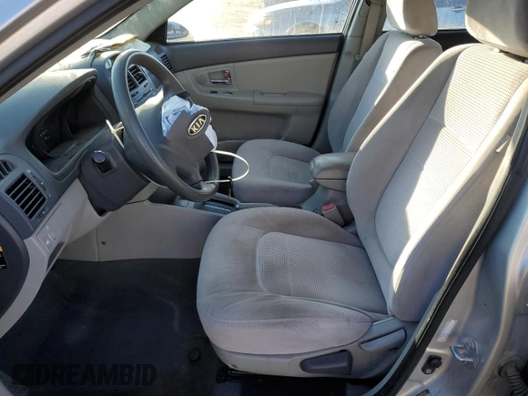 2008 Kia Spectra EX with VIN KNAFE121685507522, listed as a Copart auction lot 57908235 with 143,894 mi miles and Salvage title. Bid and sale history available at DreamBid. Image 7.