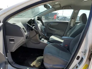 2010 Toyota Corolla with VIN 2T1BU4EE2AC329301, listed as a Copart auction lot 52970705 with 197,823 mi miles and Salvage Title. Bid and sale history available at DreamBid. Image 7.