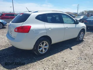 2009 Nissan Rogue S with VIN JN8AS58V29W440702, listed as a IAAI auction lot 42158143 with 311,180 mi miles. Bid and sale history available at carsss.com. Image 4.