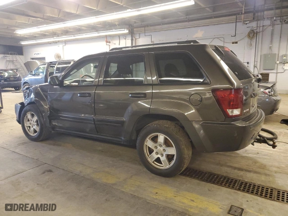 2006 Jeep Grand Cherokee Laredo with VIN 1J4GS48K26C285341, listed as a Copart auction lot 59287334 with 218,787 mi miles and Salvage Title. Bid and sale history available at carsss.com. Image 2.