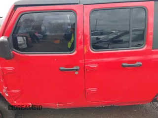 2021 Jeep Gladiator Freedom z VIN 1C6HJTAG0ML547293, wystawiony jako IAAI lot #41926067 z przebiegiem 57 696 mil mil oraz . Historia ofert i sprzedaży dostępna na DreamBid. Obrazek 13.
