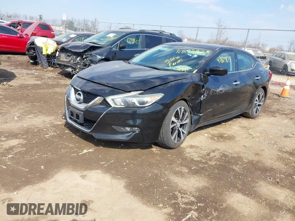 2016 Nissan Maxima SL with VIN 1N4AA6APXGC421111, listed as a IAAI auction lot 41803879 with 133,418 mi miles and . Bid and sale history available at DreamBid. Image 2.