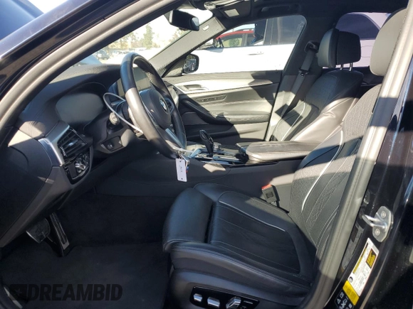 2020 BMW 5 Series M550i xDrive with VIN WBAJS7C06LBN96210, listed as a Copart auction lot 46769365 with 39,710 mi miles and Salvage title. Bid and sale history available at DreamBid. Image 7.