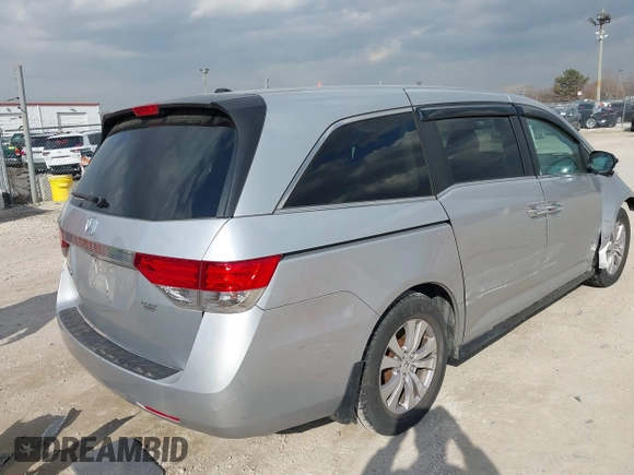 2015 Honda Odyssey EX-L with VIN 5FNRL5H61FB010289, listed as a IAAI auction lot 41887660 with 177,172 mi miles and . Bid and sale history available at carsss.com. Image 4.