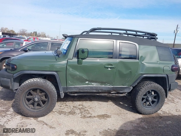 2014 Toyota FJ Cruiser with VIN JTEBU4BFXEK192640, listed as a IAAI auction lot 41349553 with 49,308 mi miles. Bid and sale history available at carsss.com. Image 14.