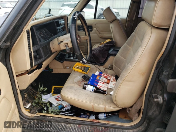 1994 Jeep Cherokee Sport with VIN 1J4FT68S0RL177339, listed as a Copart auction lot 47237805 with 207,156 mi miles and Salvage Title. Bid and sale history available at carsss.com. Image 7.