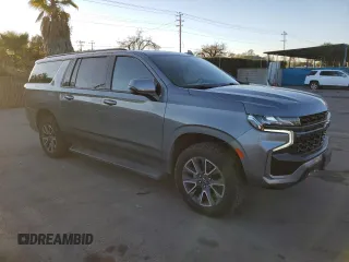 2021 Chevrolet Suburban Z71 with VIN 1GNSKDKDXMR310076, listed as a Copart auction lot 43055185 with 88,300 mi miles and Salvage title. Bid and sale history available at DreamBid. Image 4.