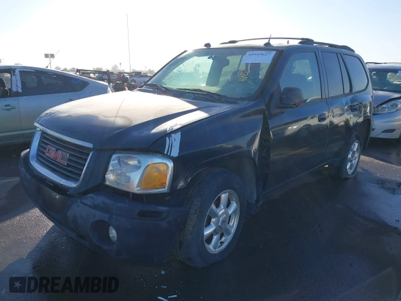 2005 GMC Envoy SLE with VIN 1GKDT13S752161375, listed as a IAAI auction lot 40945627 with 172,757 mi miles. Bid and sale history available at carsss.com. Image 2.