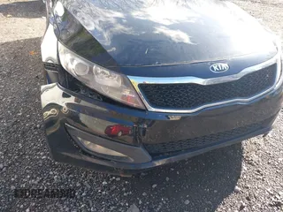 2013 Kia Optima LX with VIN 5XXGM4A79DG245910, listed as a IAAI auction lot 41853925 with 231,321 mi miles. Bid and sale history available at carsss.com. Image 6.