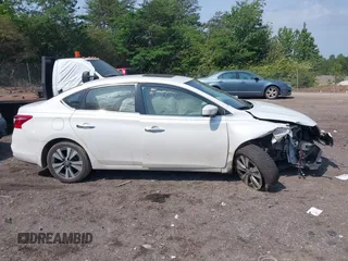 2019 Nissan Sentra S z VIN 3N1AB7AP8KY302151, wystawiony jako IAAI lot #42150965 z przebiegiem 138 486 mil mil oraz . Historia ofert i sprzedaży dostępna na DreamBid. Obrazek 12.