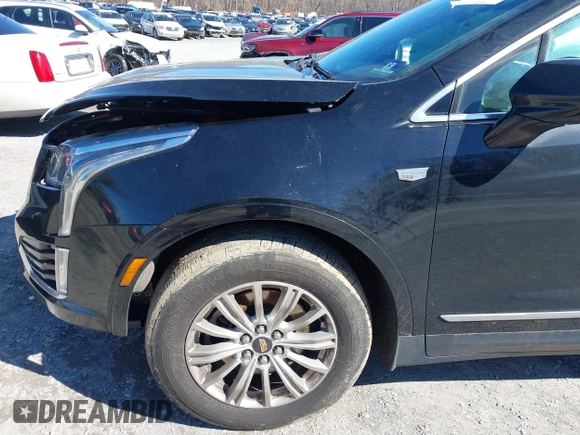 2018 Cadillac XT5 FWD with VIN 1GYKNARS5JZ235585, listed as a IAAI auction lot 41607440 with 77,220 mi miles and . Bid and sale history available at DreamBid. Image 20.