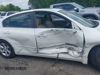 2009 Nissan Altima S z VIN 1N4AL21E39N471549, wystawiony jako IAAI lot #42203365 z przebiegiem 197 775 mil mil oraz . Historia ofert i sprzedaży dostępna na DreamBid. Obrazek 13.