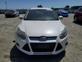 2014 Ford Focus Titanium with VIN 1FADP3N2XEL423320, listed as a Copart auction lot 58709875 with 93,011 mi miles and Salvage title. Bid and sale history available at DreamBid. Image 5.