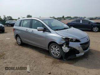 2015 Mazda 5 Sport with VIN JM1CW2BL4F0181336, listed as a Copart auction lot 60156025 with 72,079 mi miles and Salvage title. Bid and sale history available at DreamBid. Image 4.