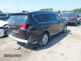 2018 Chrysler Pacifica Touring L Plus with VIN 2C4RC1EG2JR314847, listed as a IAAI auction lot 42716082 with 92,544 mi miles and . Bid and sale history available at DreamBid. Image 4.