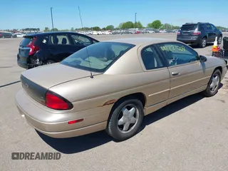 1999 Chevrolet Monte Carlo LS z VIN 2G1WW12M2X9288465, wystawiony jako IAAI lot #42221009 z przebiegiem 62 218 mil mil oraz . Historia ofert i sprzedaży dostępna na DreamBid. Obrazek 4.