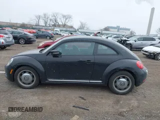 2012 Volkswagen Beetle 2.5L PZEV with VIN 3VWJP7AT0CM628169, listed as a IAAI auction lot 41628754 with 64,770 mi miles. Bid and sale history available at carsss.com. Image 14.