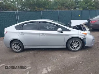 2015 Toyota Prius Four z VIN JTDKN3DU0F0455819, wystawiony jako IAAI lot #42169941 z przebiegiem 63 861 mil mil oraz . Historia ofert i sprzedaży dostępna na DreamBid. Obrazek 13.